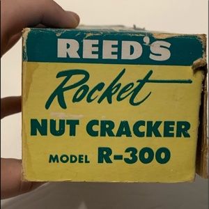 A vintage Reed’s Rocket nut cracker in box.